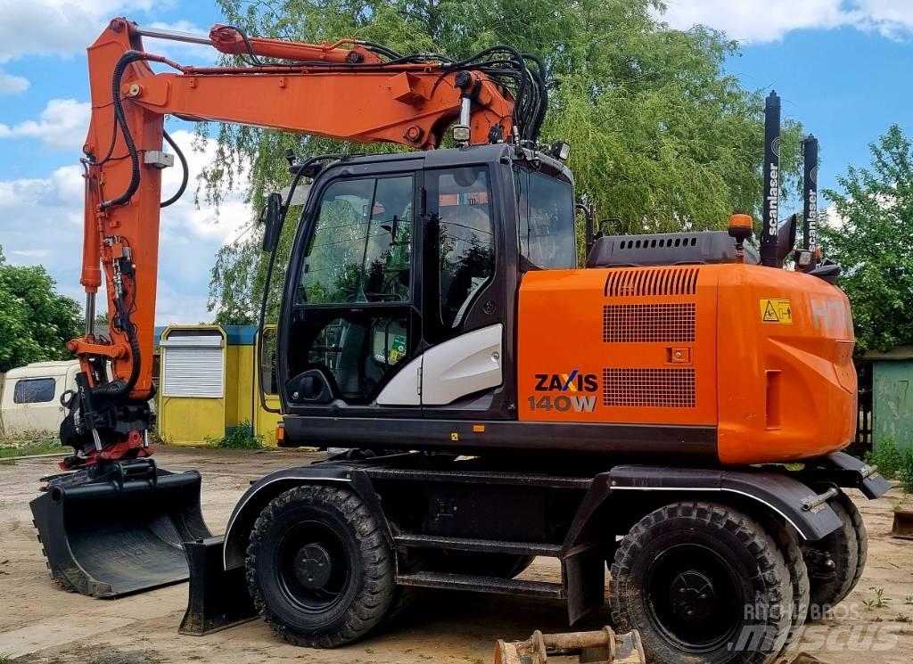 Hitachi 140W Колісні екскаватори