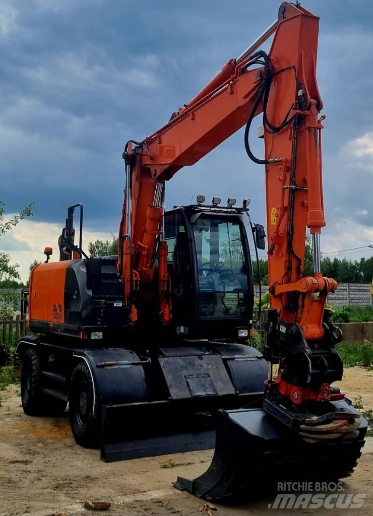 Hitachi 140W Колісні екскаватори