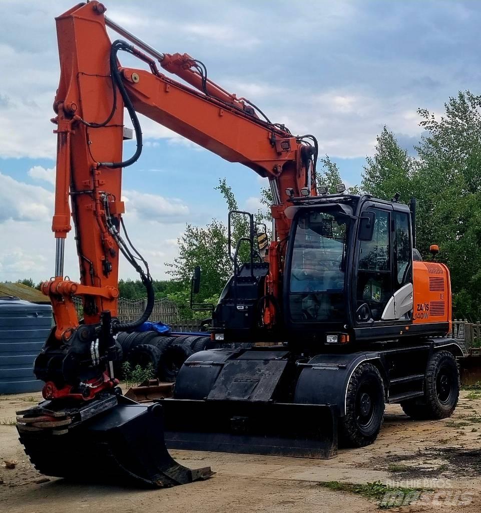 Hitachi 140W Колісні екскаватори