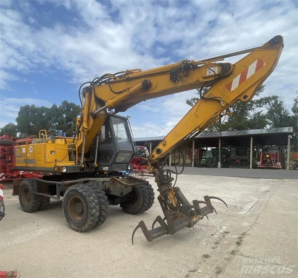JCB 130 W Колісні екскаватори