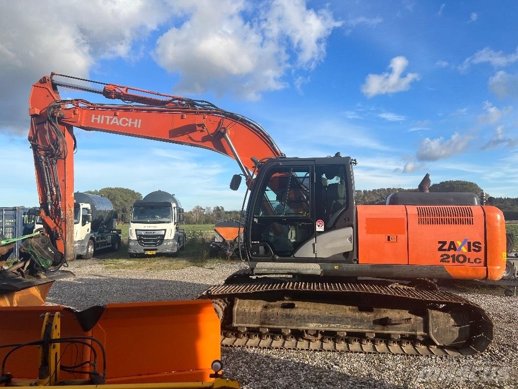 Hitachi ZX 210 Гусеничні екскаватори