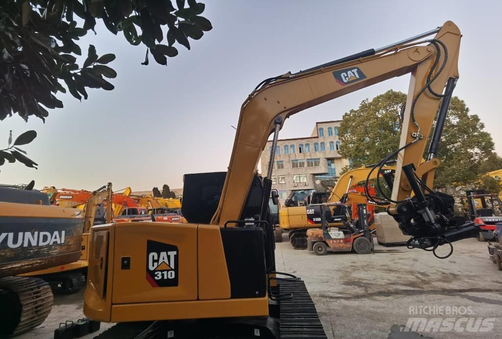 CAT 310 Гусеничні екскаватори