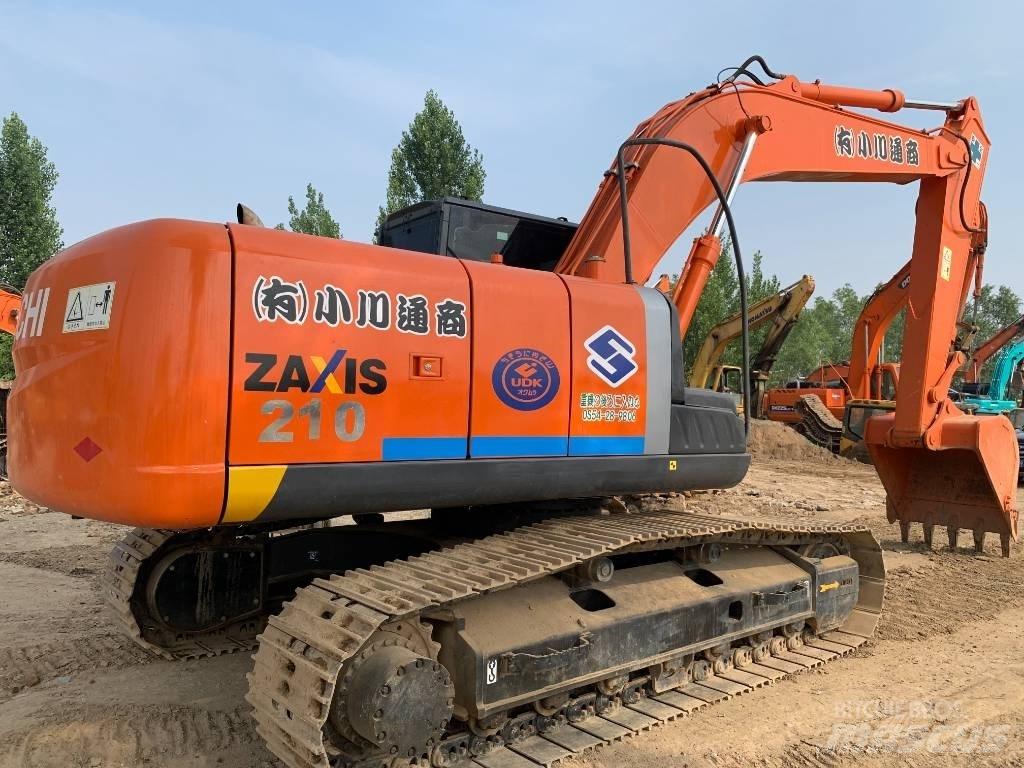 Hitachi ZX210G Гусеничні екскаватори