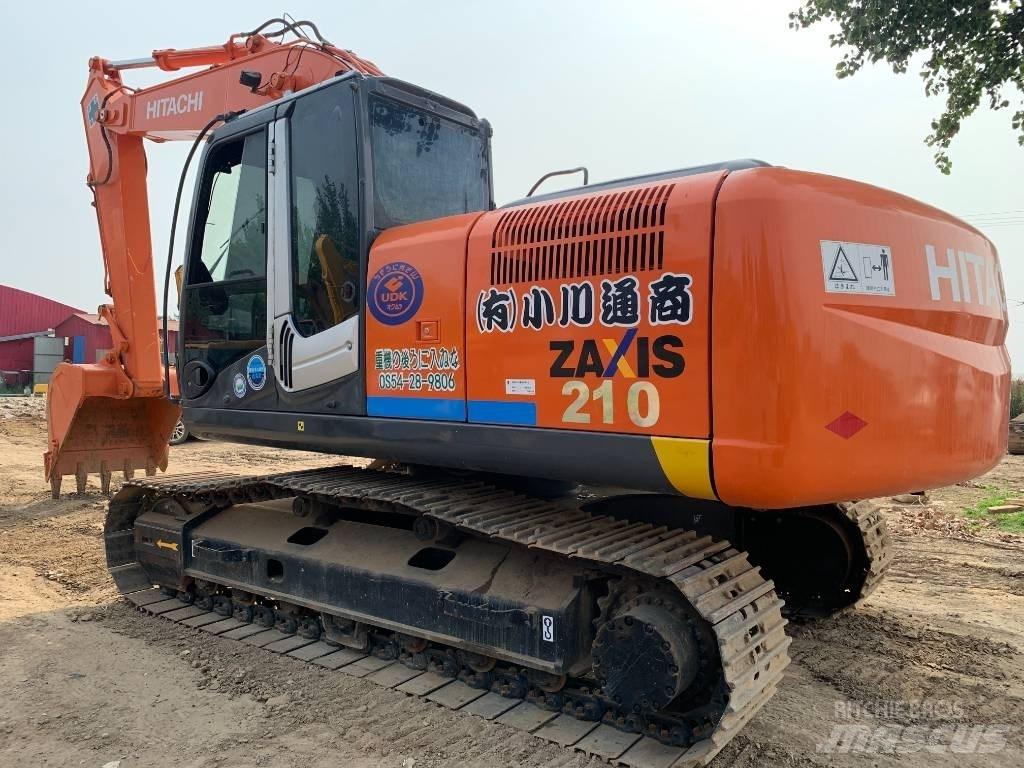 Hitachi ZX210G Гусеничні екскаватори