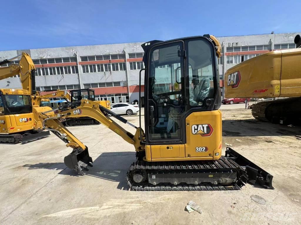 CAT 302 Міні-екскаватори < 7т
