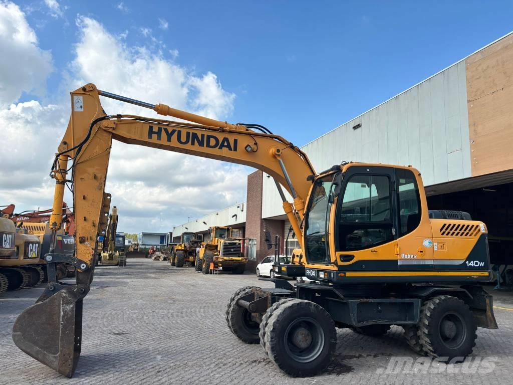 Hyundai 140W-9 Колісні екскаватори