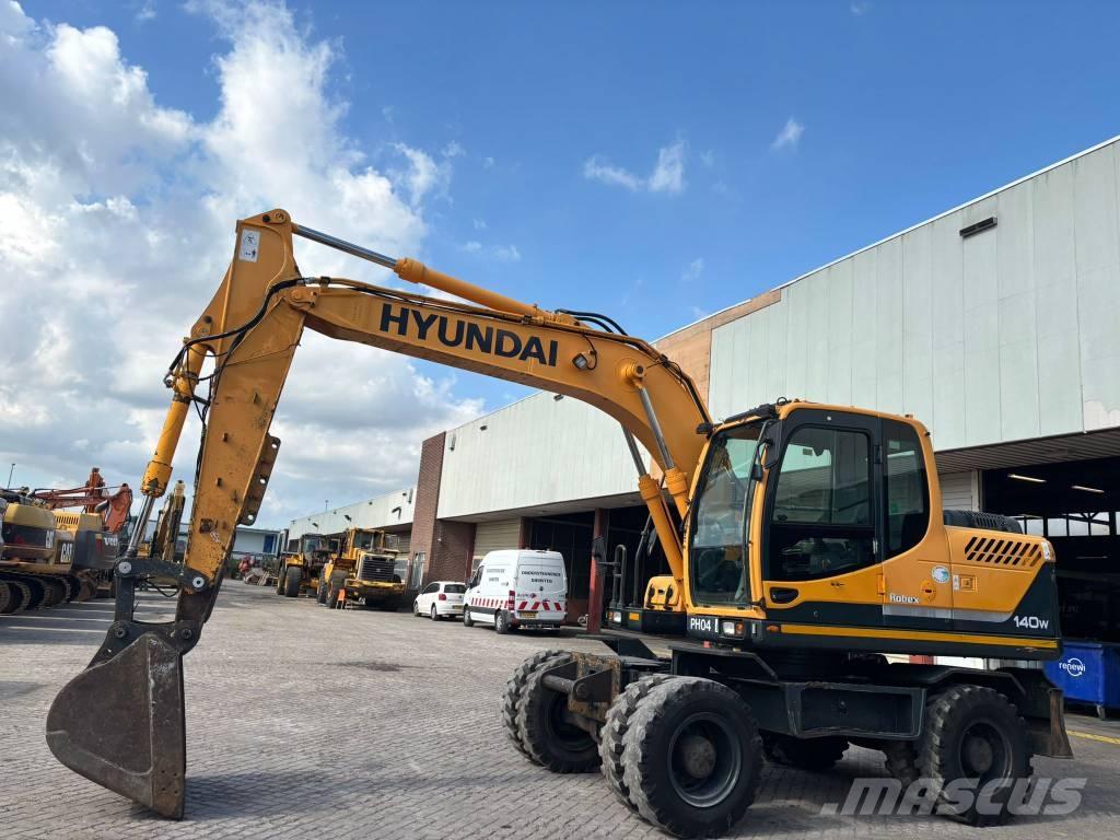 Hyundai 140W-9 Колісні екскаватори