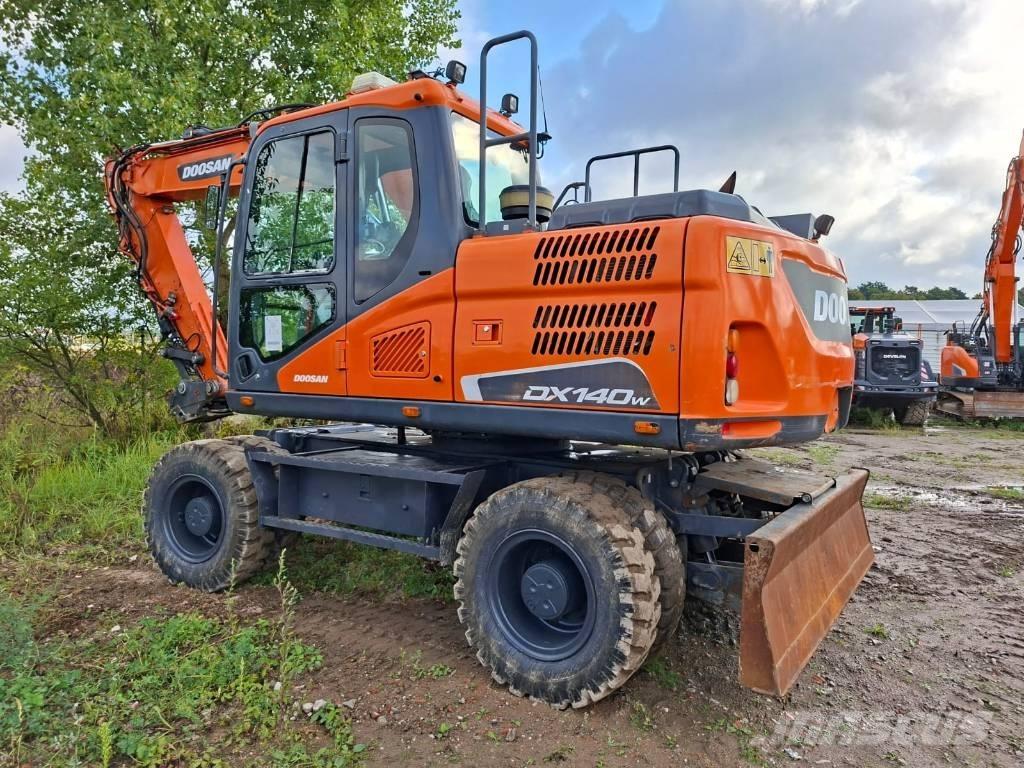 Doosan DX140W-5 Колісні екскаватори