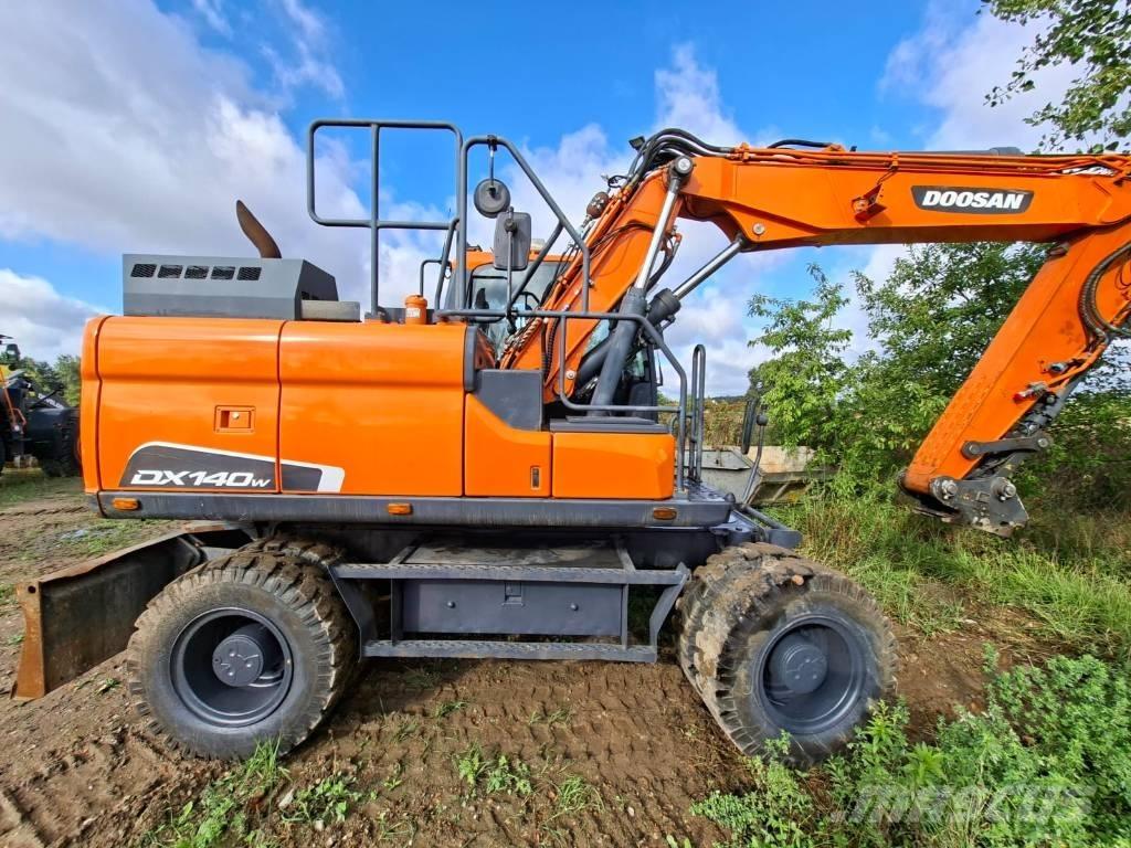 Doosan DX140W-5 Колісні екскаватори