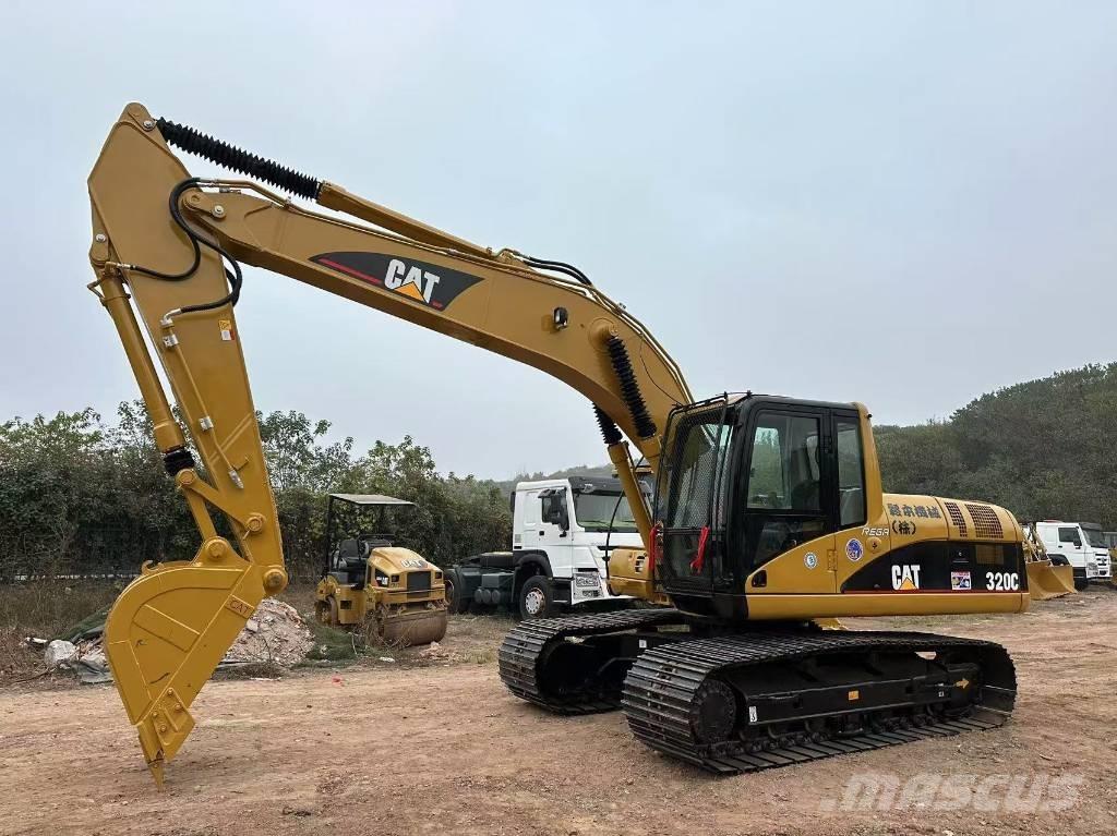 CAT 320 C Гусеничні екскаватори