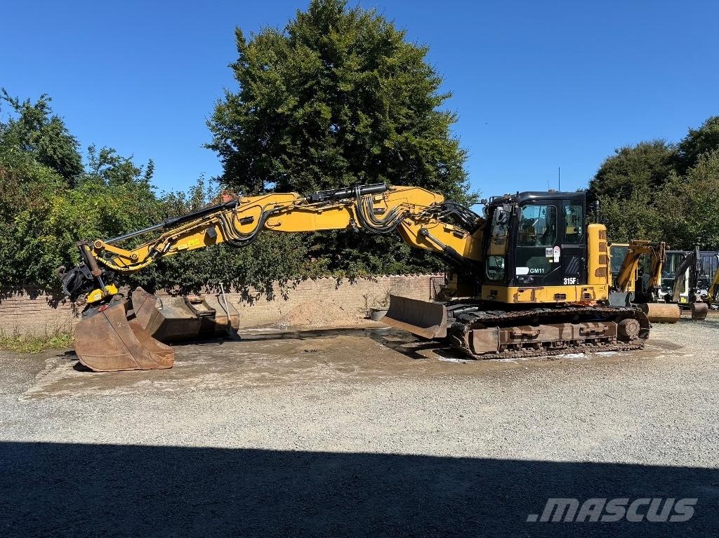 CAT 315 Гусеничні екскаватори