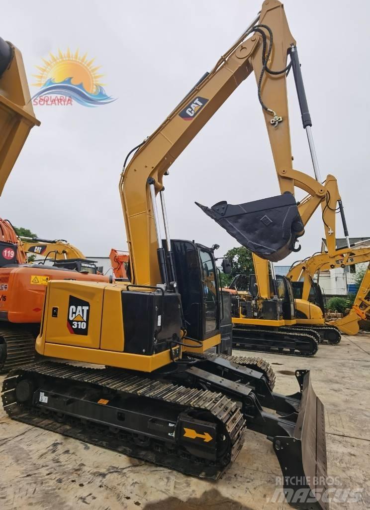 CAT 310 Гусеничні екскаватори