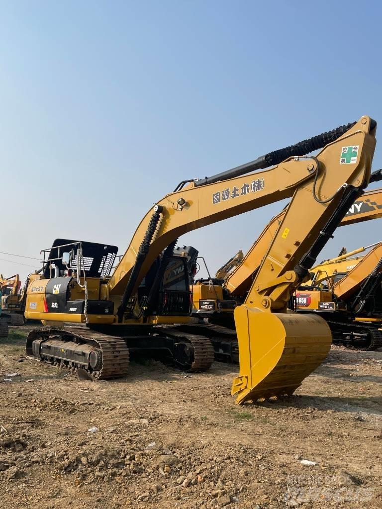 CAT 329D2 Середні екскаватори 7т. - 12т.