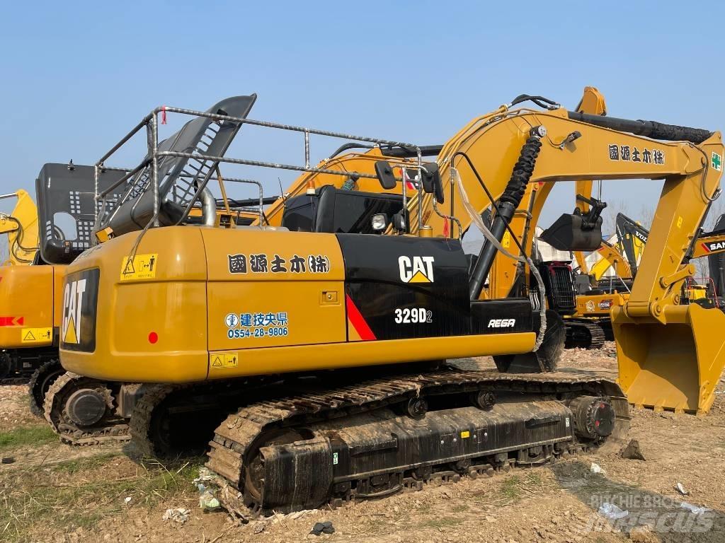 CAT 329D2 Середні екскаватори 7т. - 12т.