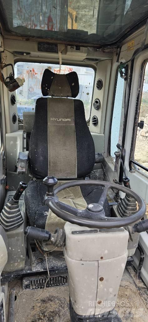 Hyundai 140W-7 Колісні екскаватори
