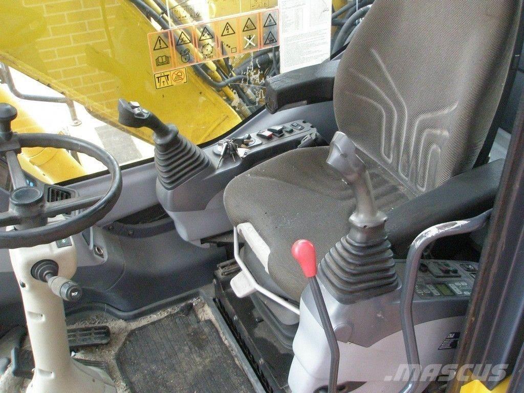 Komatsu PW140-7 Колісні екскаватори