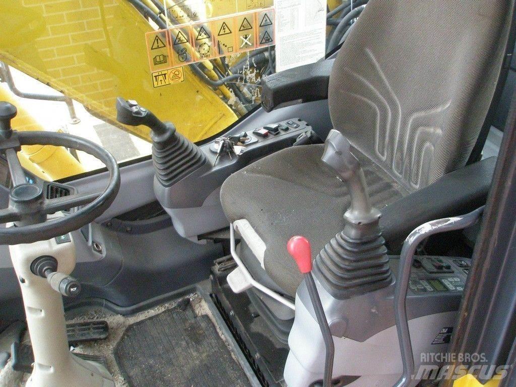 Komatsu PW140-7 Колісні екскаватори