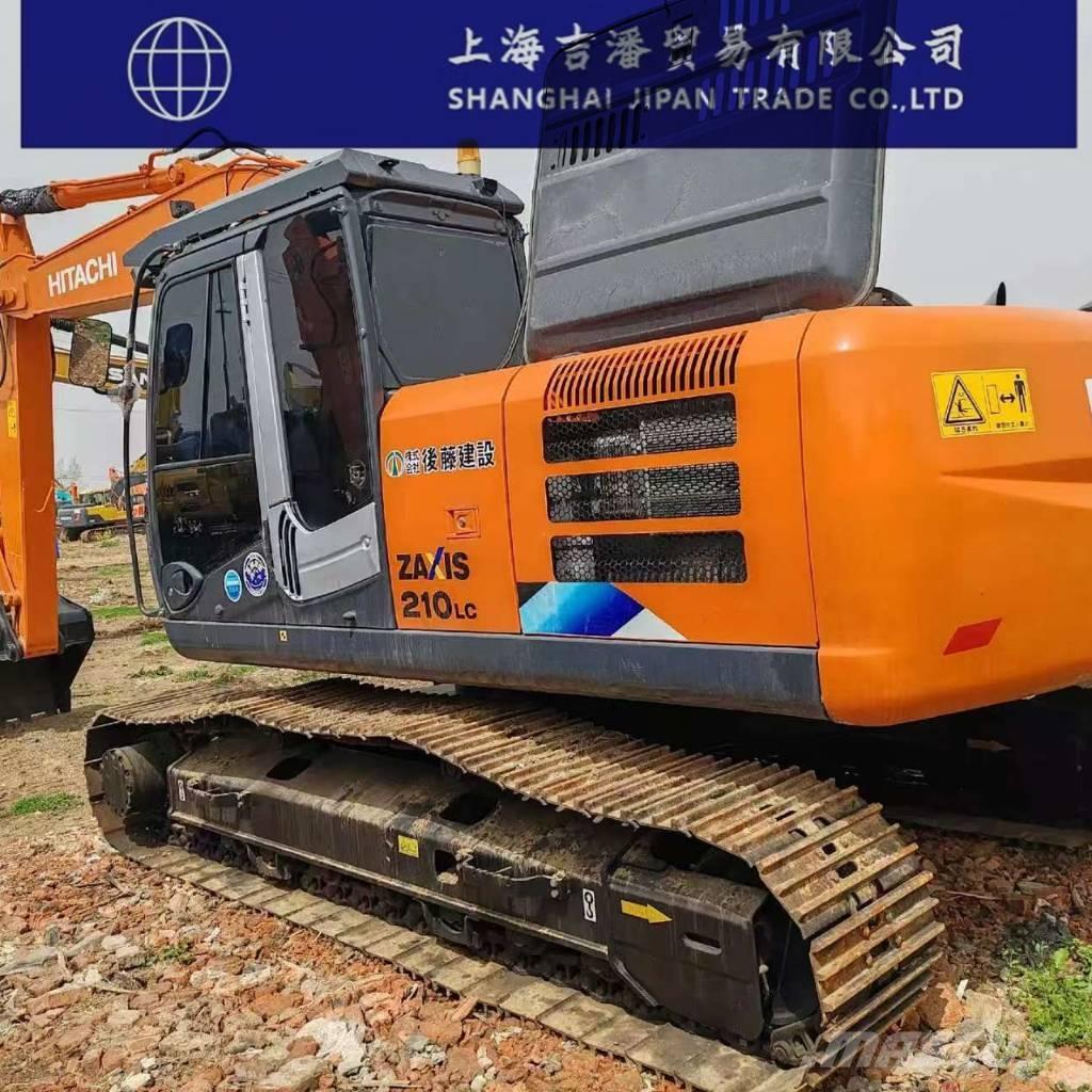 Hitachi ZX 210 Гусеничні екскаватори