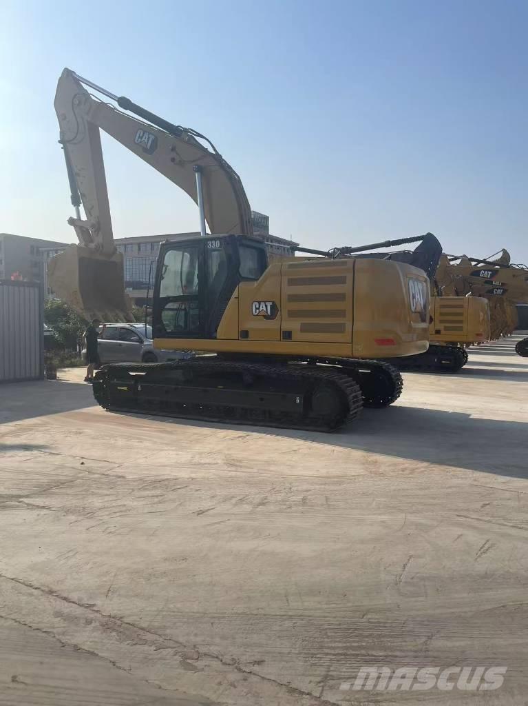 CAT 330 Гусеничні екскаватори