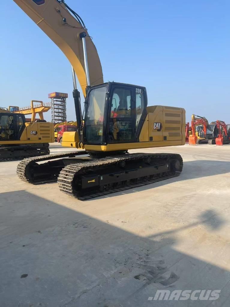 CAT 330 Гусеничні екскаватори