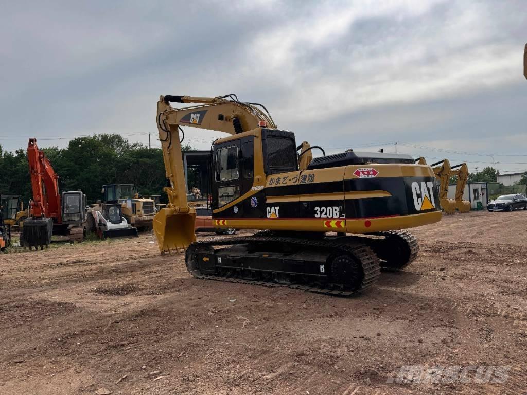CAT 320B Гусеничні екскаватори