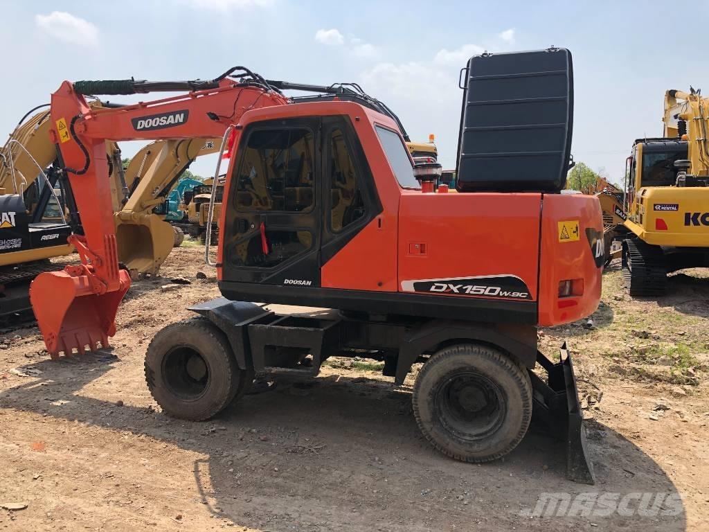 Doosan DX150W Гусеничні екскаватори