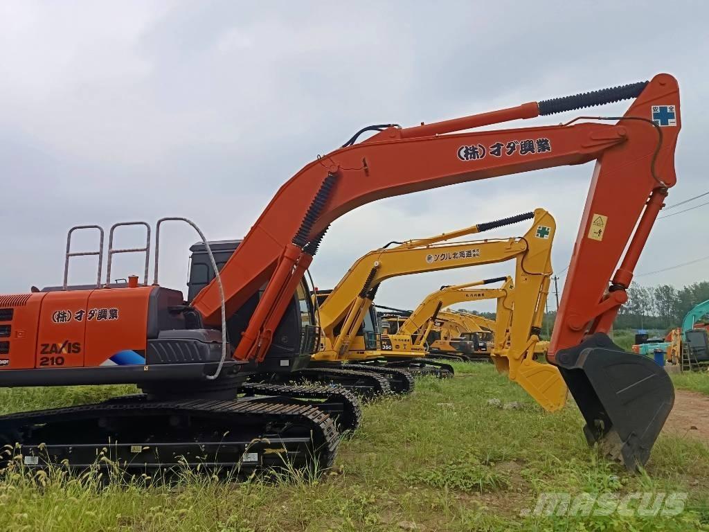 Hitachi ZX 210 Гусеничні екскаватори