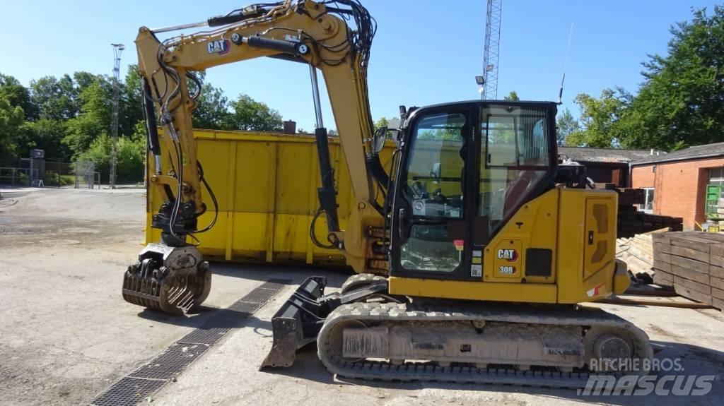 CAT 308 CR Середні екскаватори 7т. - 12т.