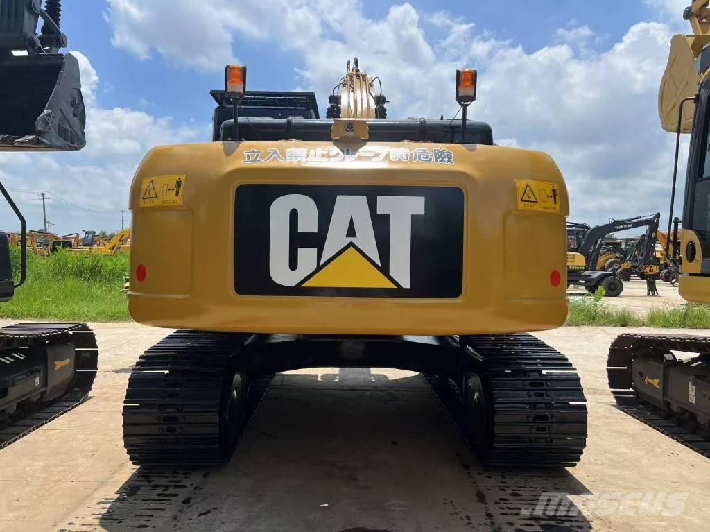 CAT 323 D Гусеничні екскаватори