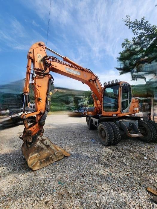 Doosan DX 140 W Колісні екскаватори