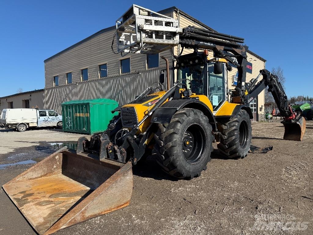 Huddig 1260 C Екскаватори-навантажувачі