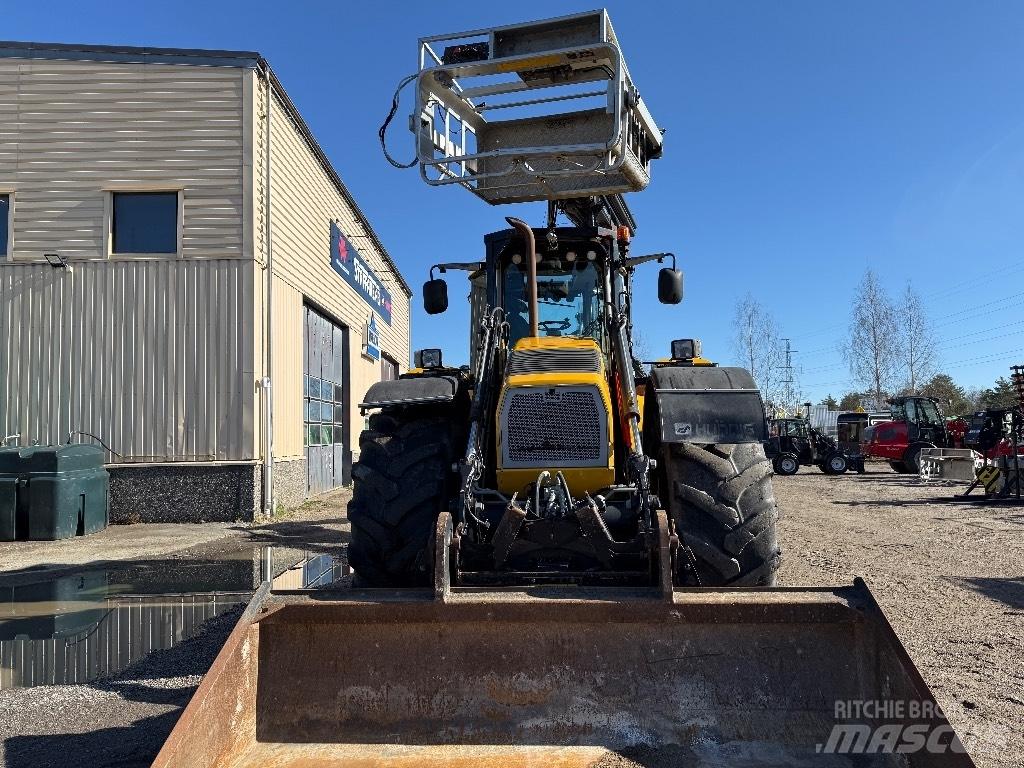 Huddig 1260 C Екскаватори-навантажувачі