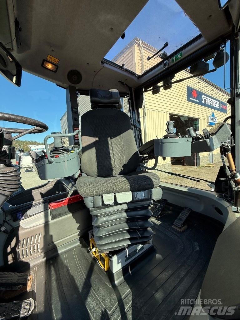 Huddig 1260 C Екскаватори-навантажувачі