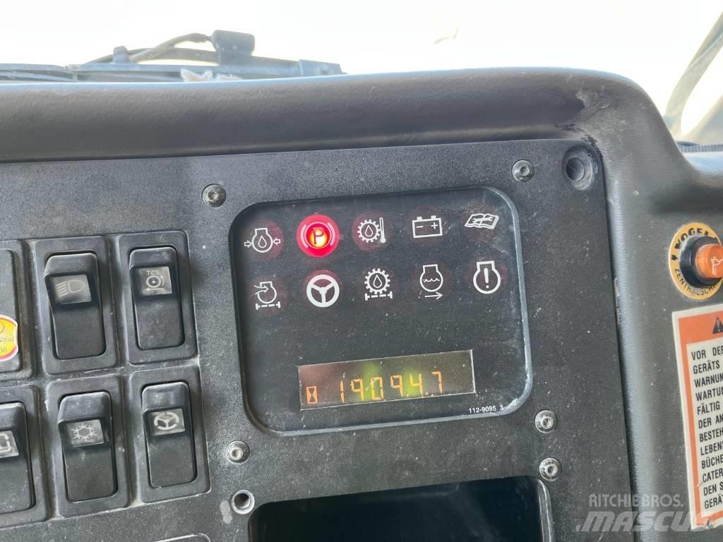 CAT 771D Кар`єрні самоскиди