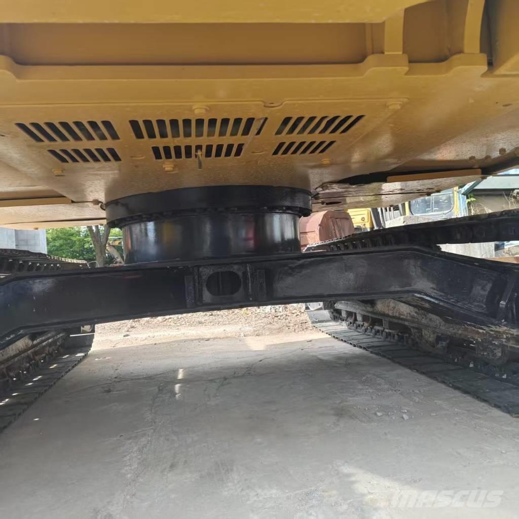 CAT 310 Гусеничні екскаватори