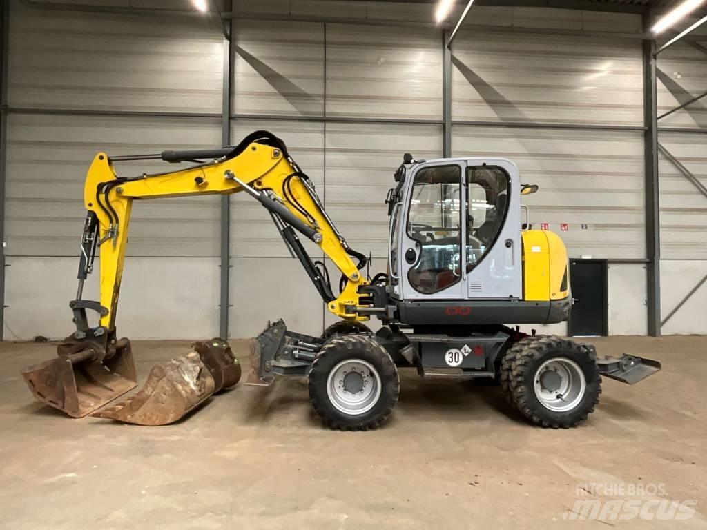 Neuson EW 100 Колісні екскаватори