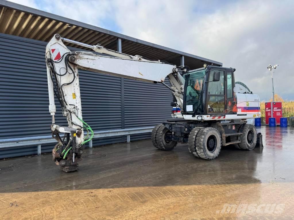 CAT M315D Колісні екскаватори