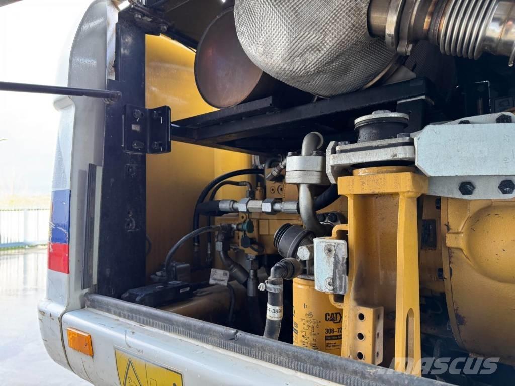 CAT M315D Колісні екскаватори