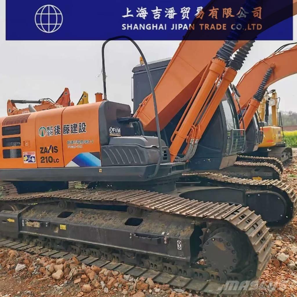 Hitachi ZX 210 Гусеничні екскаватори