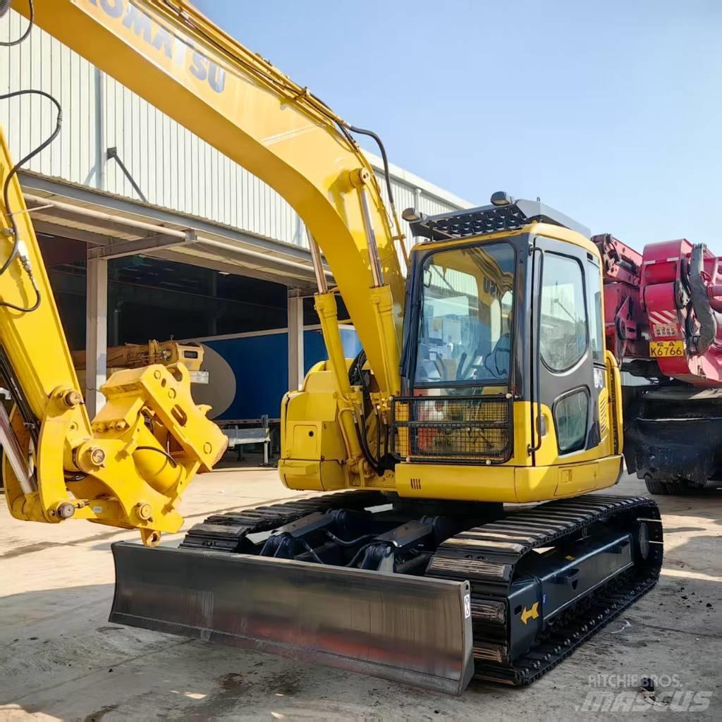 Komatsu PC 128 US Середні екскаватори 7т. - 12т.