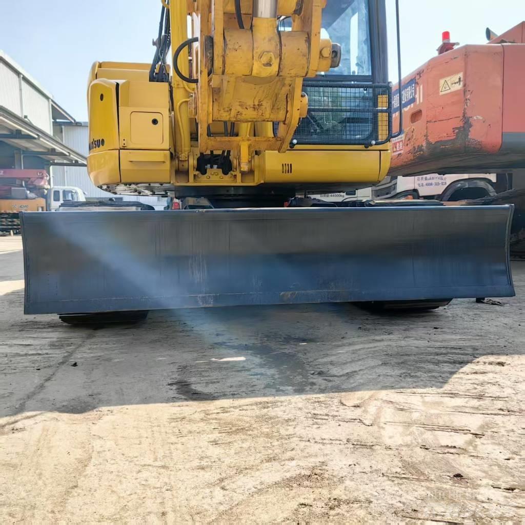 Komatsu PC 128 US Середні екскаватори 7т. - 12т.