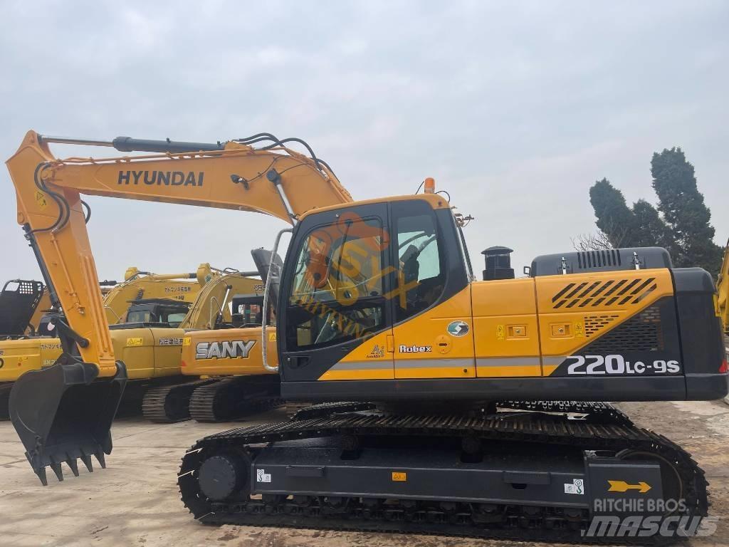 Hyundai Robex 220 Гусеничні екскаватори