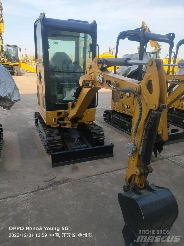 CAT 302 CR Колісні екскаватори