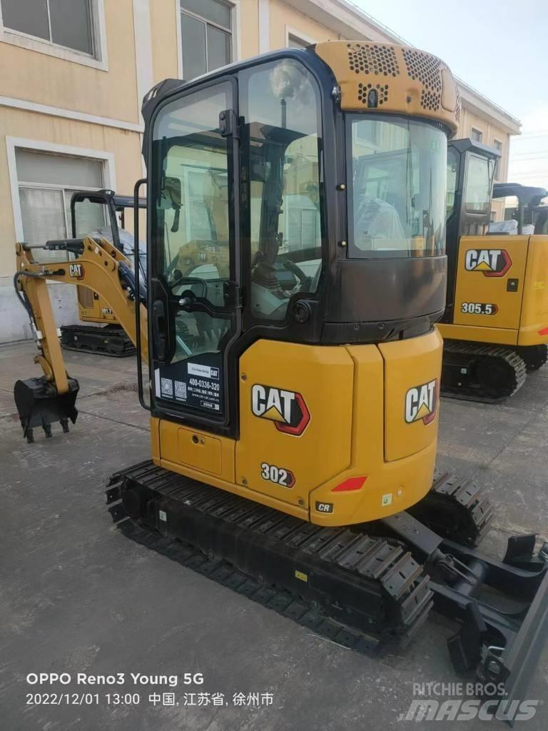 CAT 302 CR Колісні екскаватори