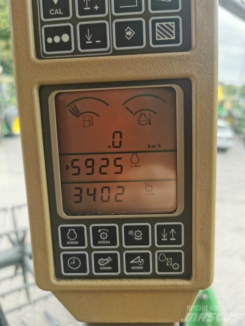 John Deere T560 Зернозбиральні комбайни