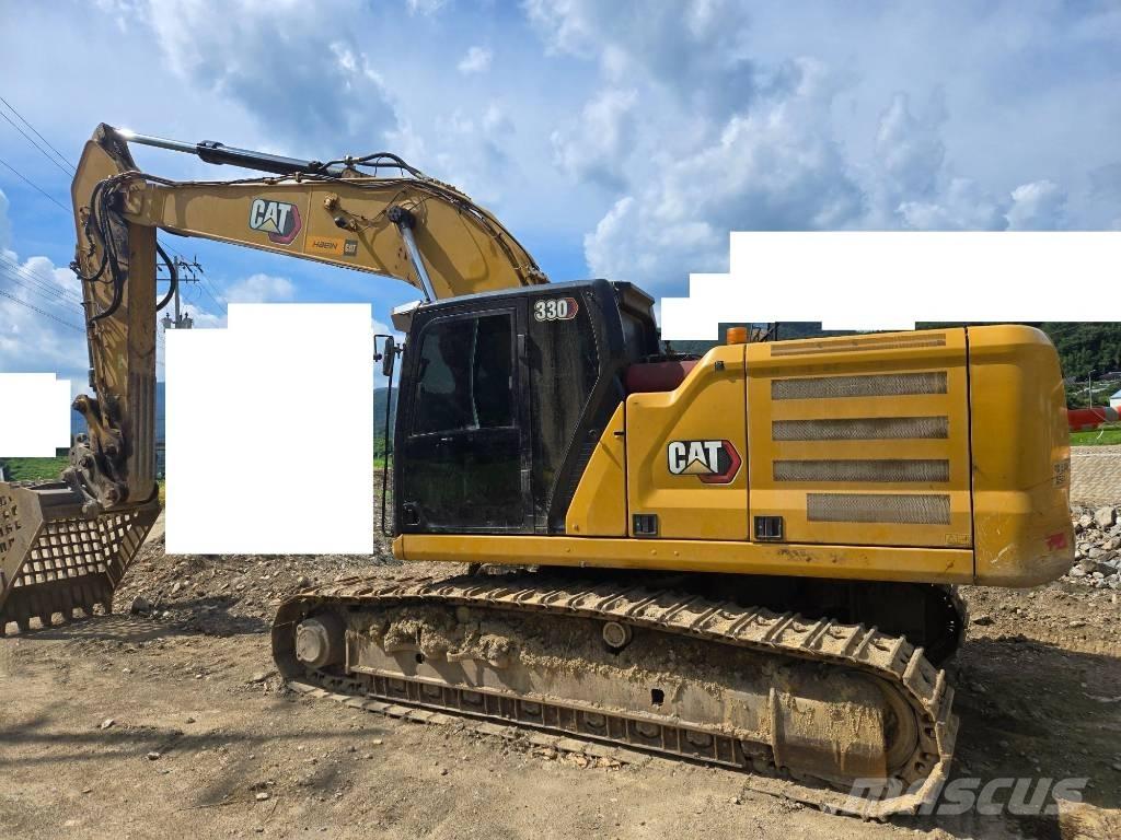 CAT 330 Гусеничні екскаватори