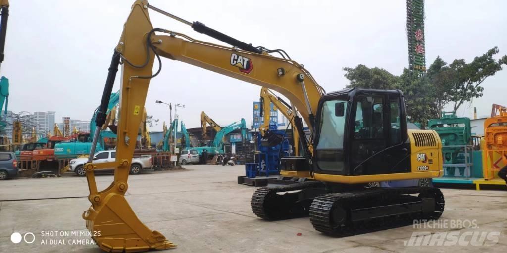 CAT 2021 CAT 313D2GC Колісні екскаватори