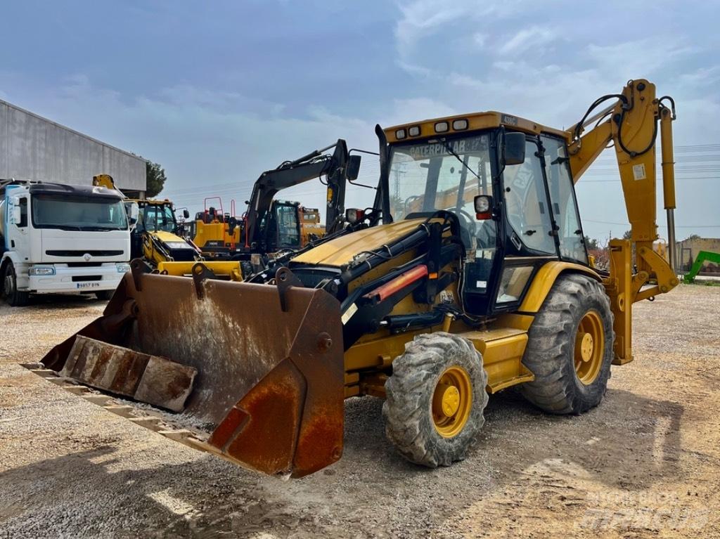 CAT 438 C Екскаватори-навантажувачі