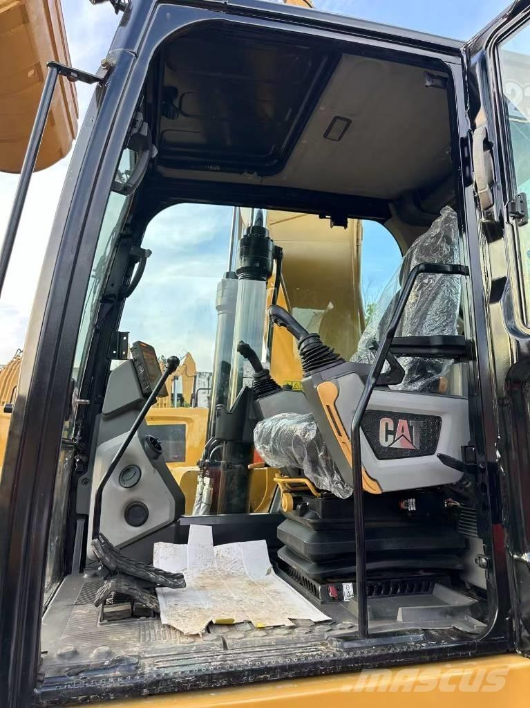 CAT 323 Гусеничні екскаватори