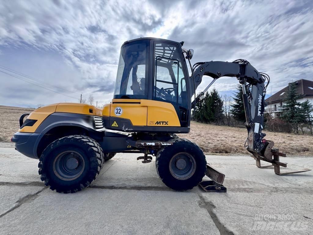 Mecalac 12 MTX Екскаватори-навантажувачі